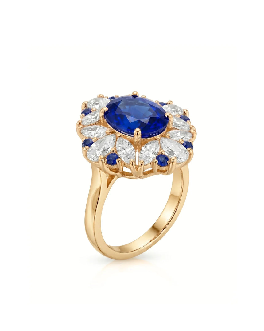 Unheated blue sapphire cocktail ring with diamond floral halo in 18K yellow gold | SARATTI