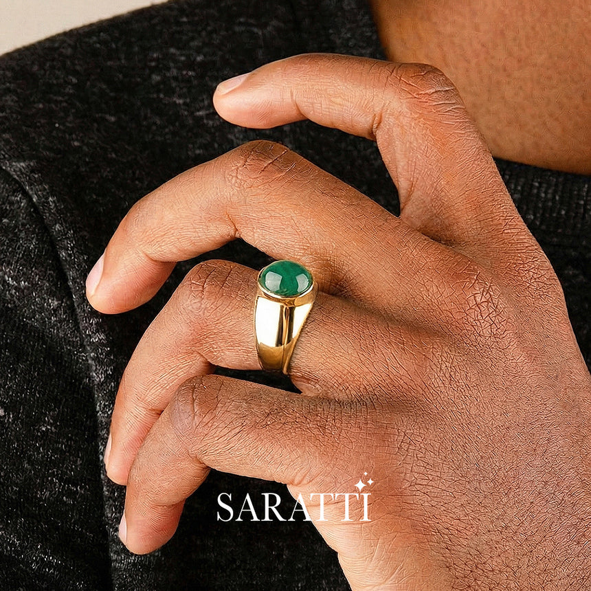 Mens emerald ring oval cabochon worn on hand in 18K yellow gold | SARATTI