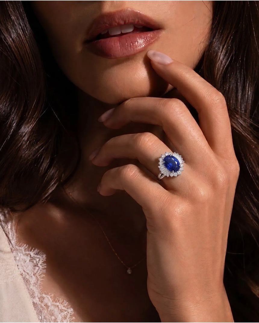 Vintage-inspired sapphire ring with tapered baguette diamonds and pavé split shank in white gold | SARATTI