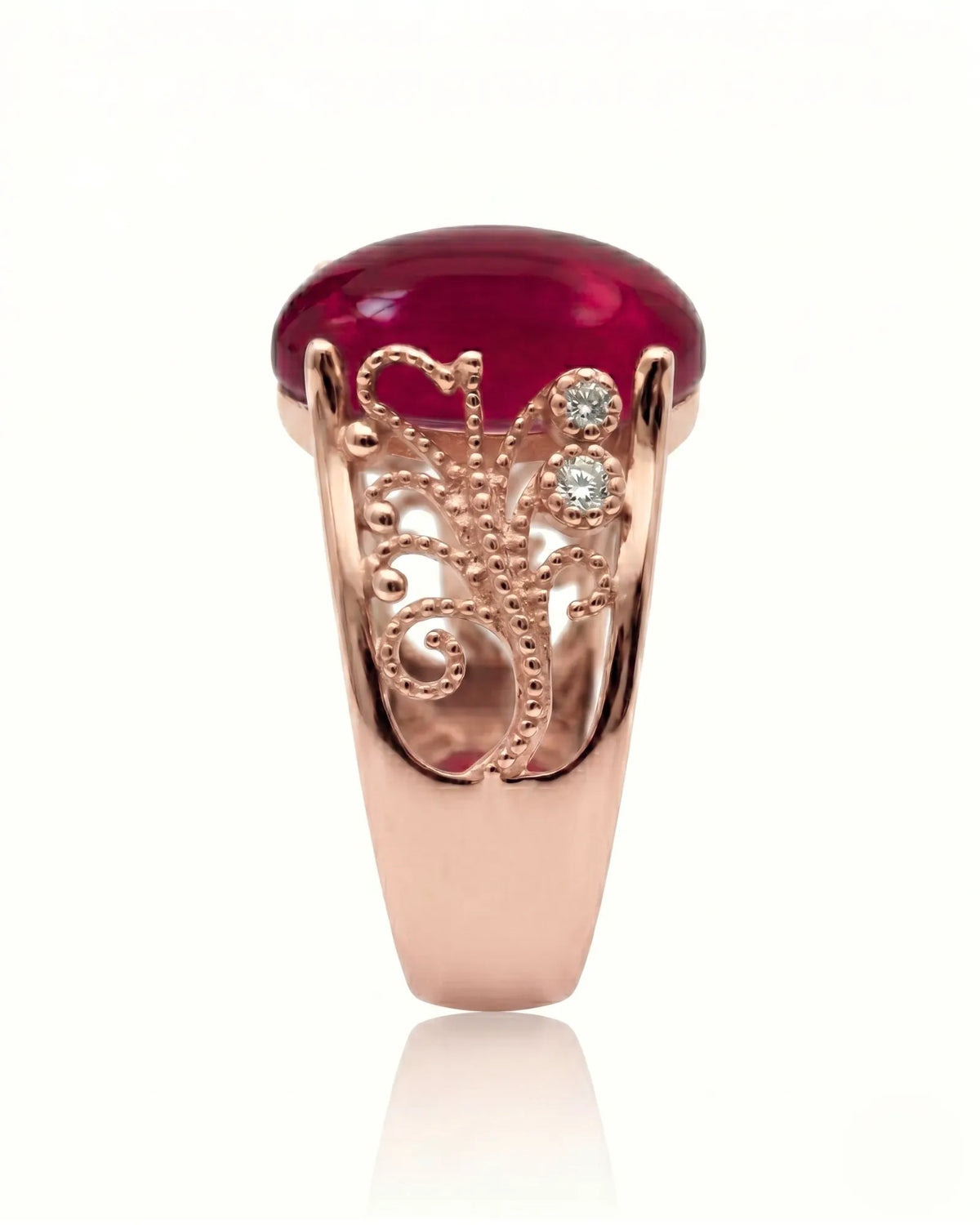 Vintage ruby ring with scrollwork sides and round diamonds in rose gold | SARATTI