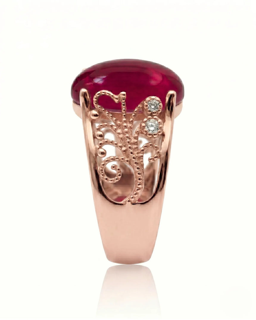 Vintage ruby ring with scrollwork sides and round diamonds in rose gold | SARATTI