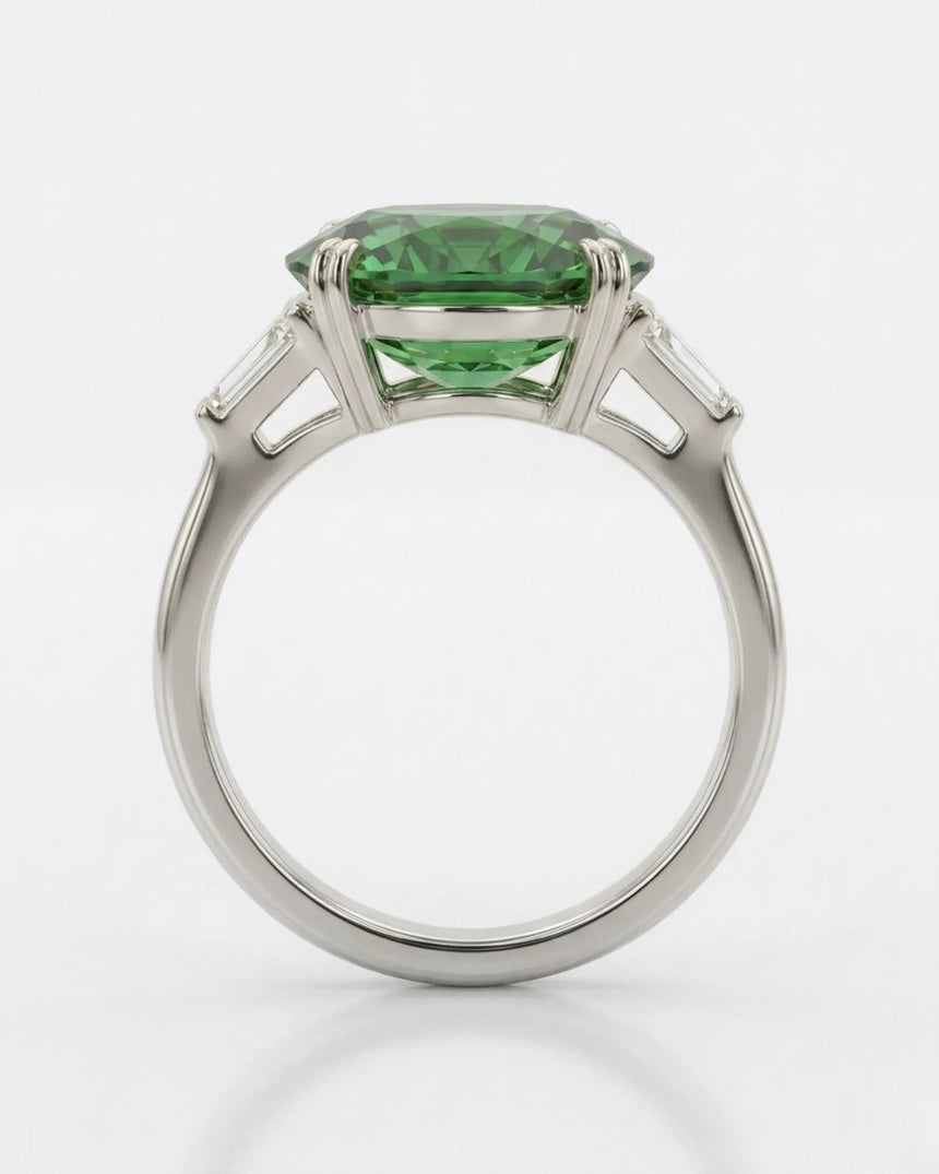 Vivid oval tourmaline ring with emerald-cut diamonds in a refined platinum design | SARATTI