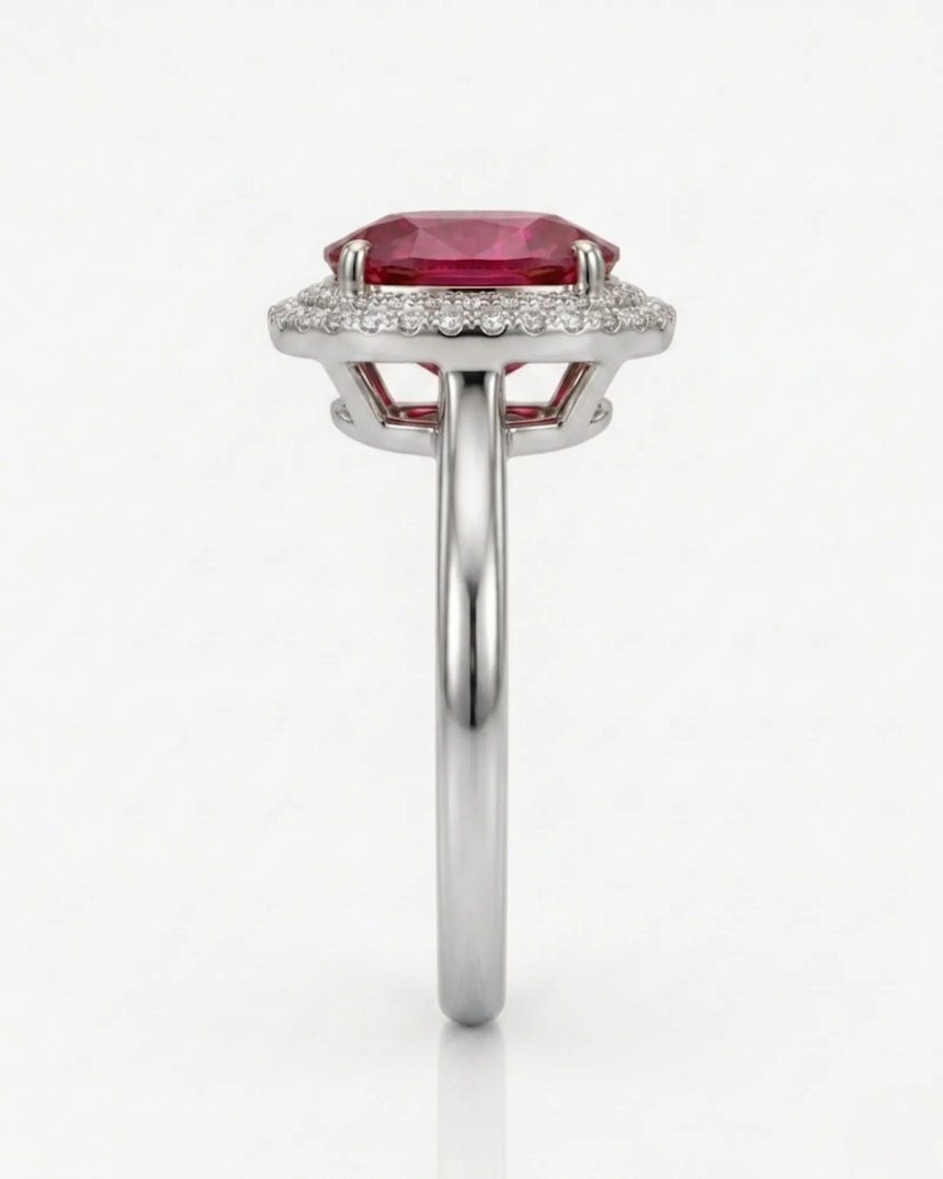 Vivid pink oval tourmaline ring framed by natural diamonds in 18K white gold | SARATTI