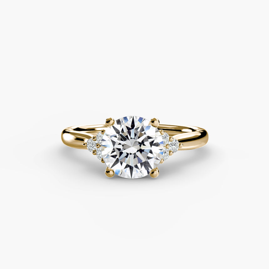 Round three-stone shoulder engagement ring setting yellow gold | SARATTI