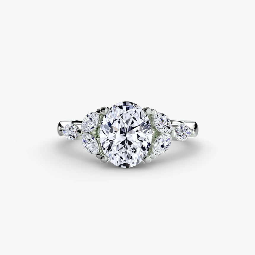 Diamond ring with a white background - Oval Cut Diamond with Marquise side stones set in Platinum Ring - SARATTI
