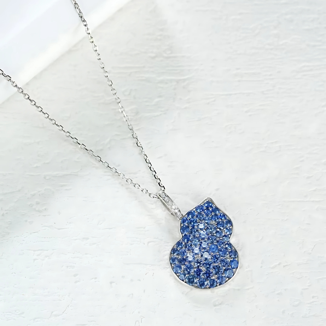 Azure Temptation: Blue Sapphire Apple Pendant Necklace