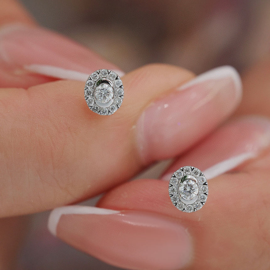Petite Pave Set Oval Diamond Earring in Model's Fingers | Saratti | Custom High and Fine Jewelry