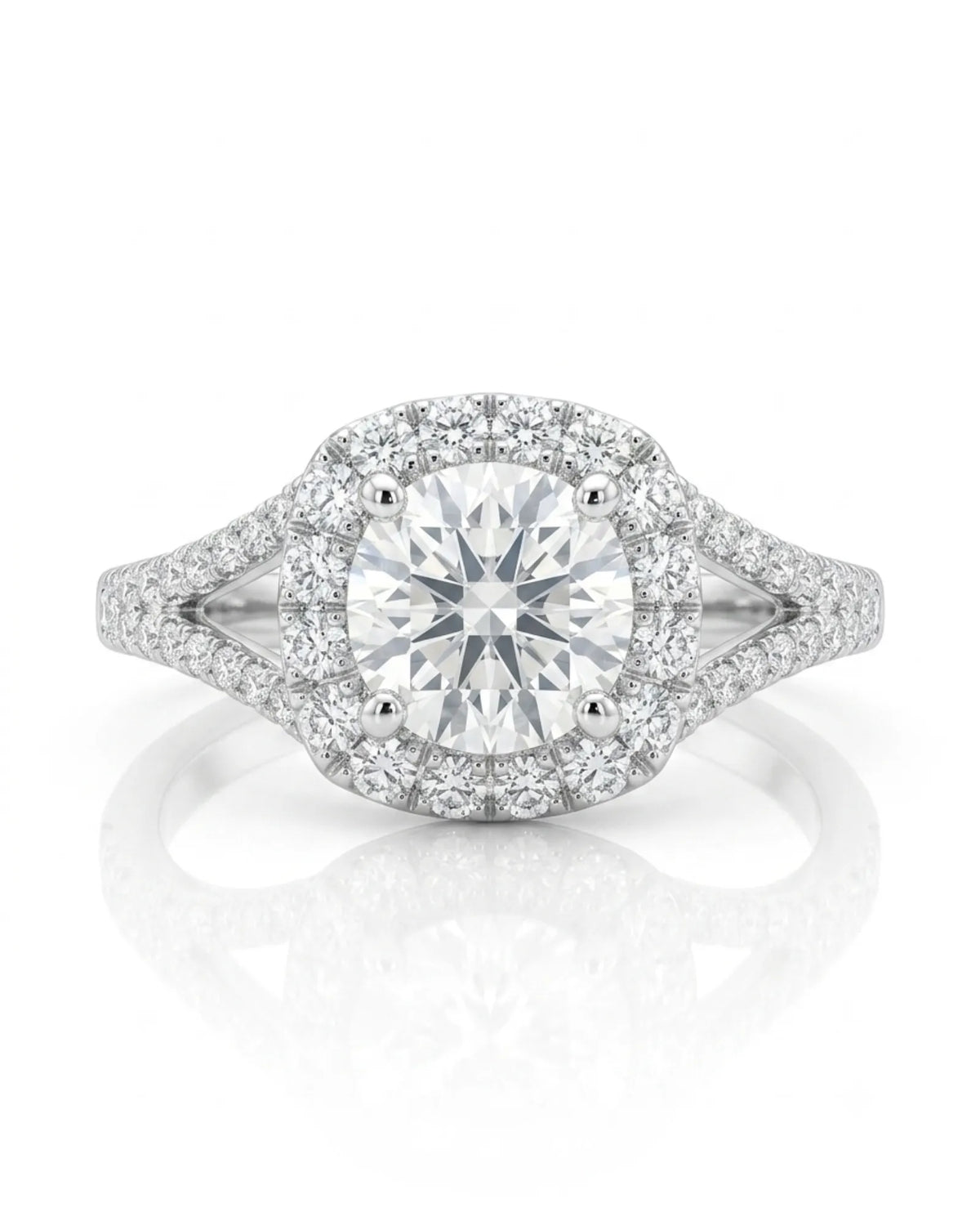 White gold split shank moissanite ring set with halo center and pavé accents across both rings | SARATTI