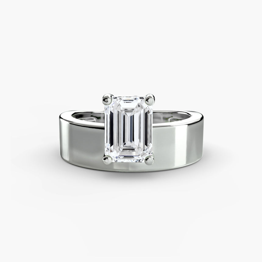 Wide band emerald cut solitaire engagement ring setting in white gold | SARATTI