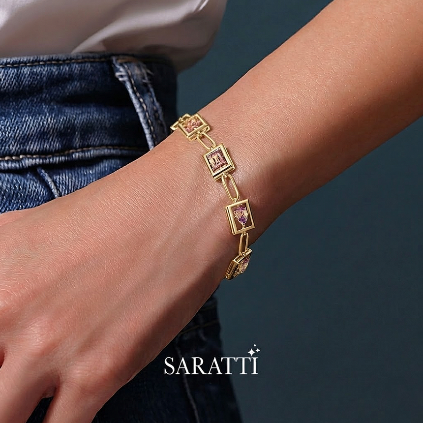 Gold bracelet with gemstones on a wrist, brand 'SARATTI' visible | Yellow Gold Morganite Bracelet Detail Shot – SARATTI