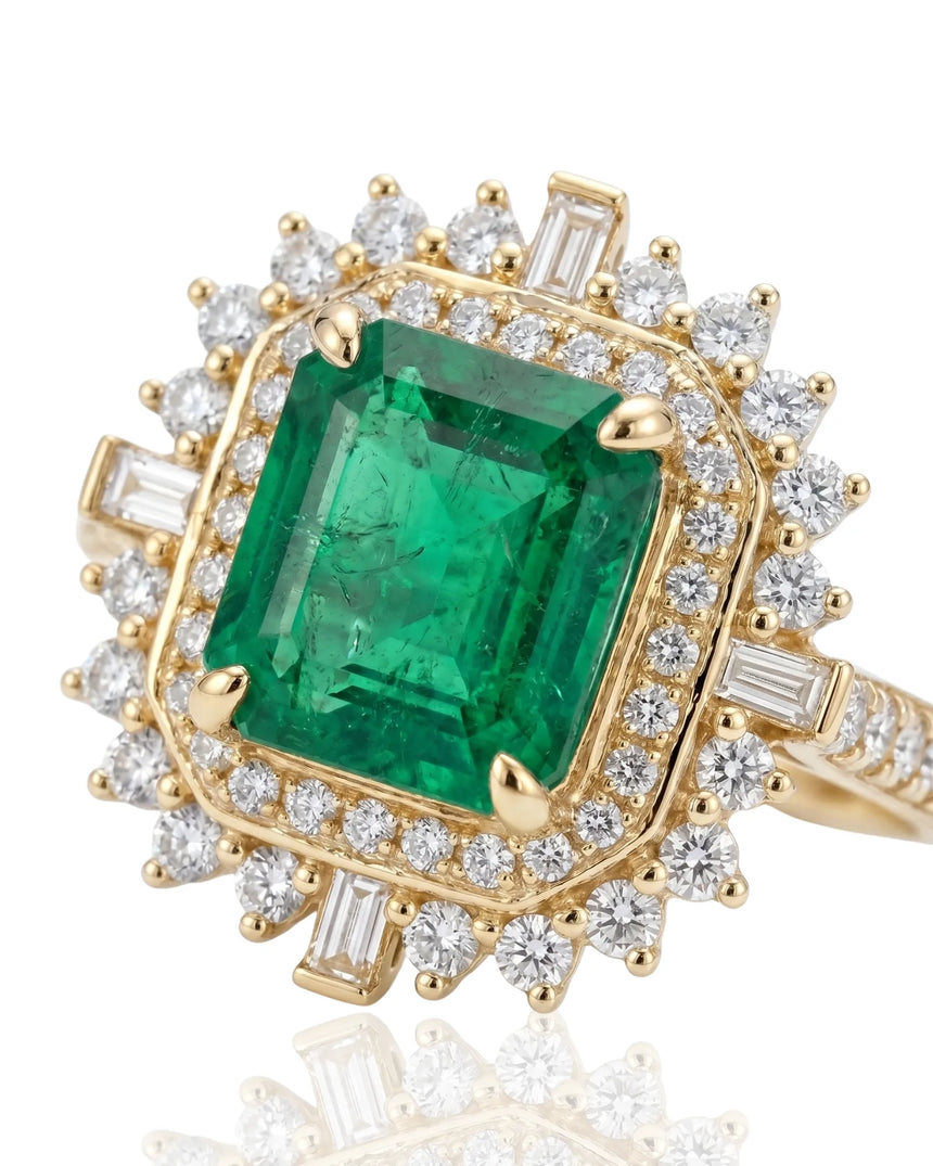 Yellow gold emerald and diamond ring with bold halo design - SARATTI
