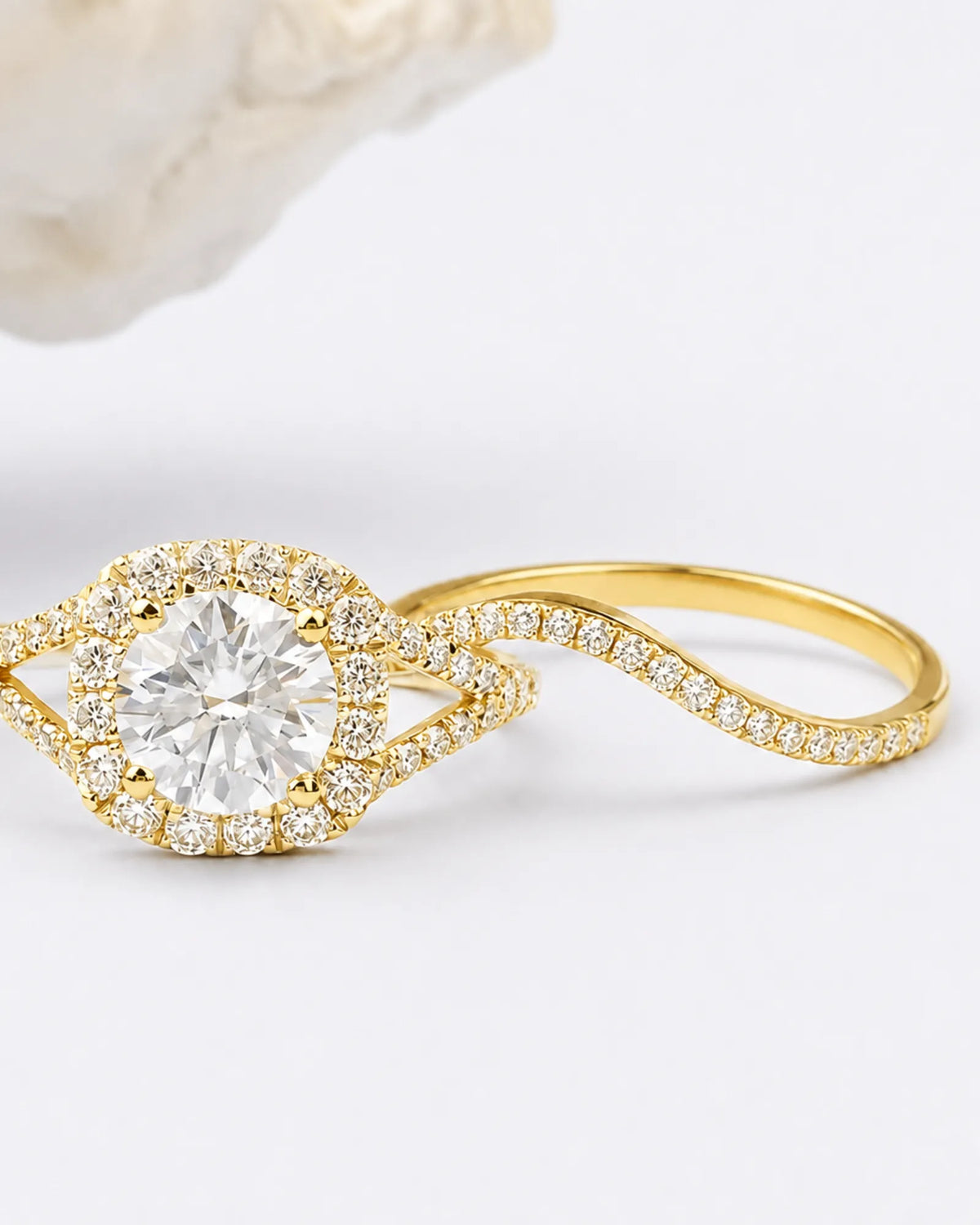 Yellow gold moissanite bridal set designed for a radiant and elegant engagement and wedding pairing | SARATTI