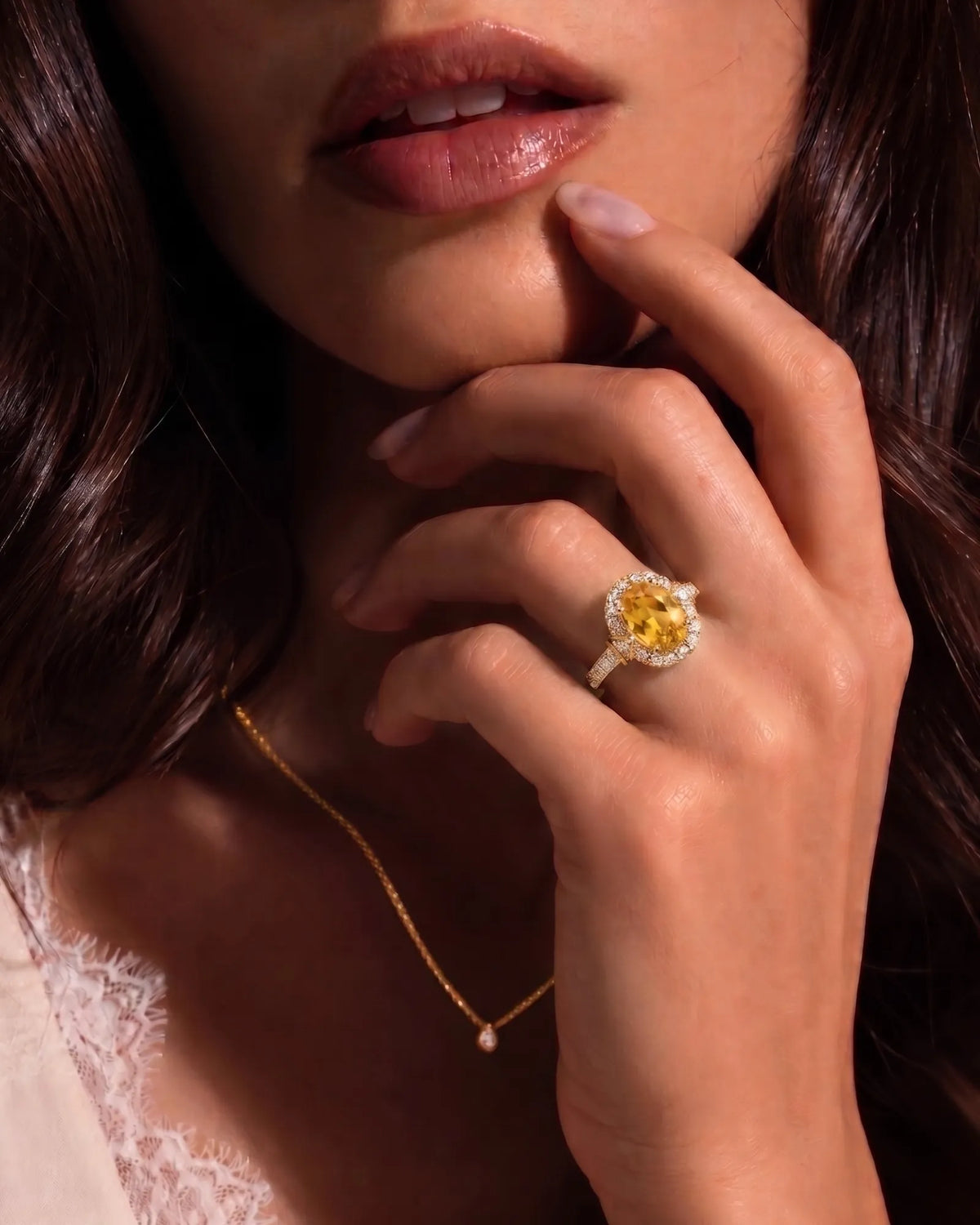 Yellow sapphire and diamond engagement ring with halo design in yellow gold | SARATTI