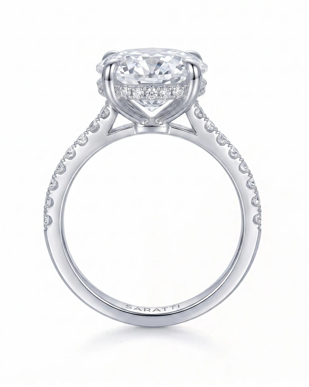 Adriana 1 carat F-colour oval natural diamond hidden halo ring in 18K white gold, side profile showing hidden halo and raised gallery | SARATTI