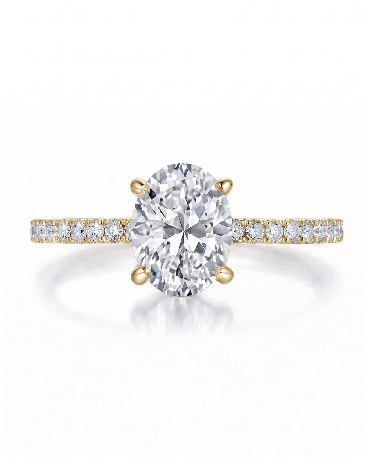 Adriana 1 carat F-colour oval natural diamond hidden halo ring in 18K yellow gold, front view of oval centre and pavé shoulders | SARATTI