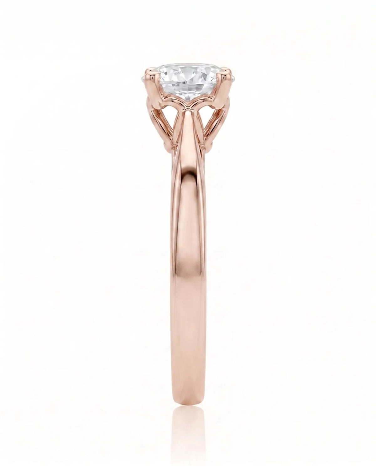 ARIA 1 carat round natural diamond solitaire engagement ring in 18K rose gold, side profile showing elevated open basket | SARATTI