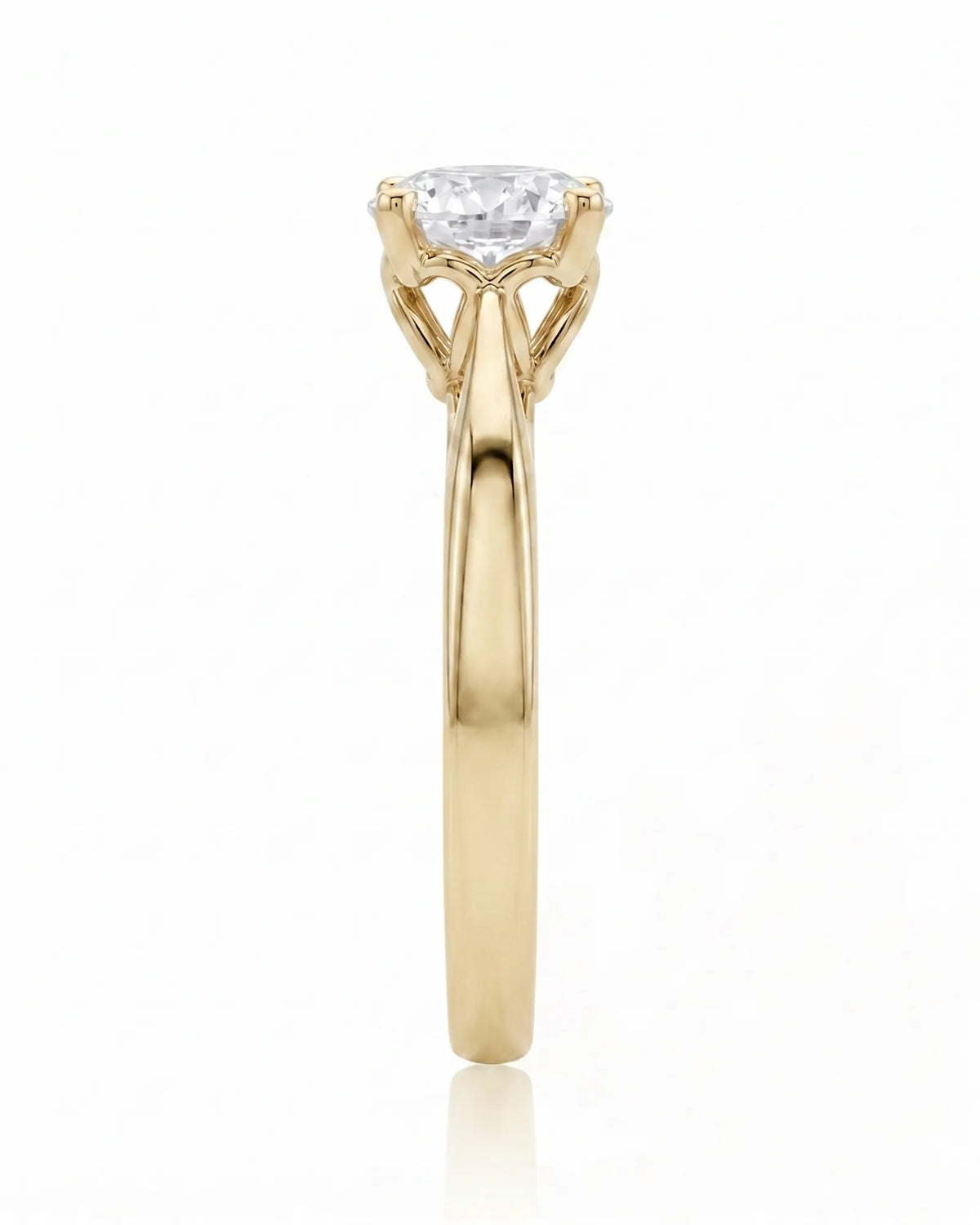 ARIA 1 carat round natural diamond solitaire engagement ring in 18K yellow gold, side profile showing elevated open basket | SARATTI