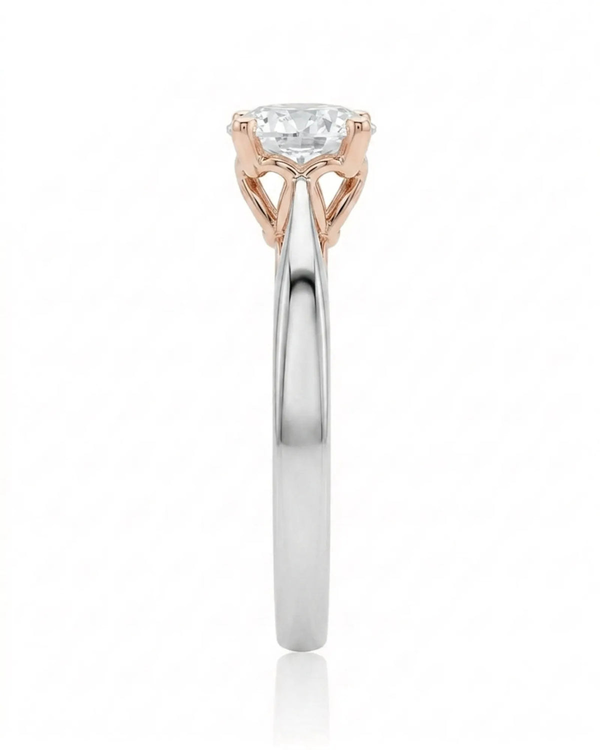 ARIA 1 carat round natural diamond two-tone solitaire engagement ring in 18K white and rose gold, side profile showing elevated open basket | SARATTI