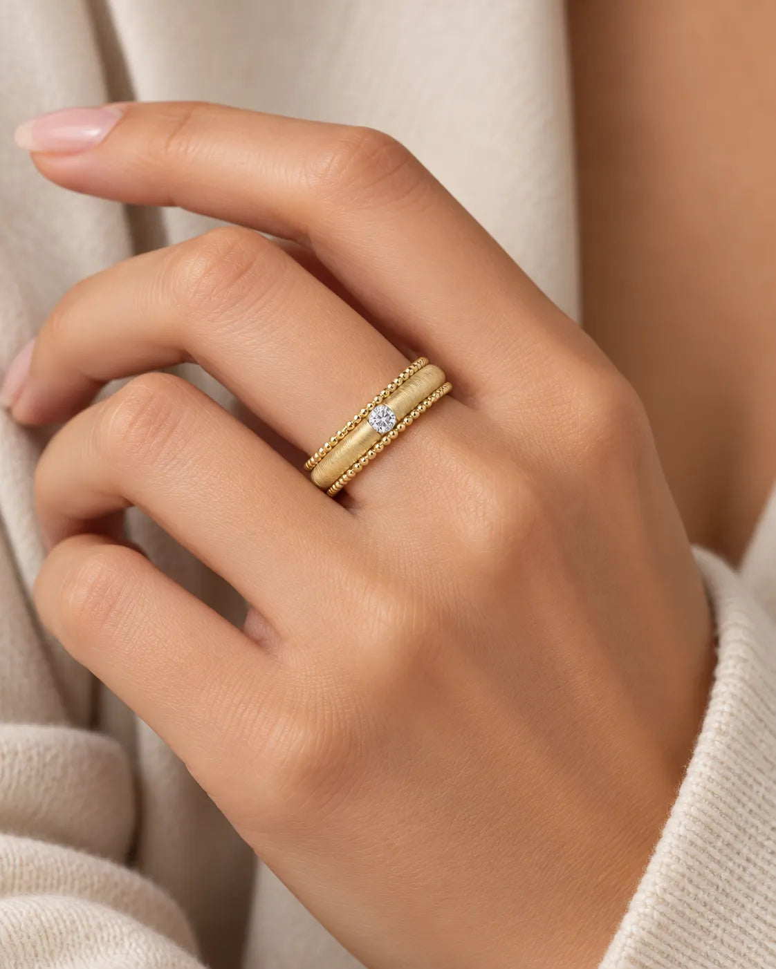 Art Nouveau diamond wedding band worn on hand in 18K yellow gold | SARATTI