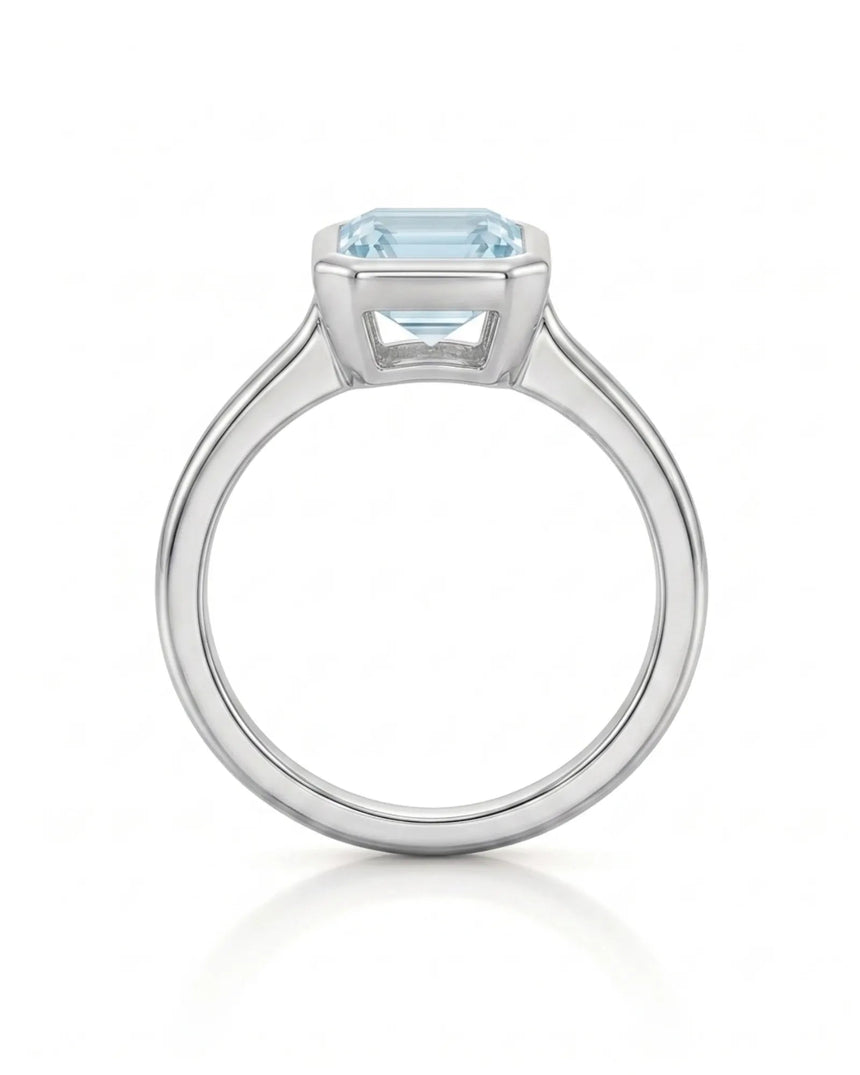 AUREX emerald cut Aquamarine bezel ring setting in Platinum, top view | SARATTI