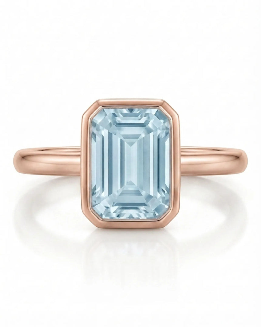 AUREX emerald cut Aquamarine bezel ring setting in Rose Gold, front view | SARATTI