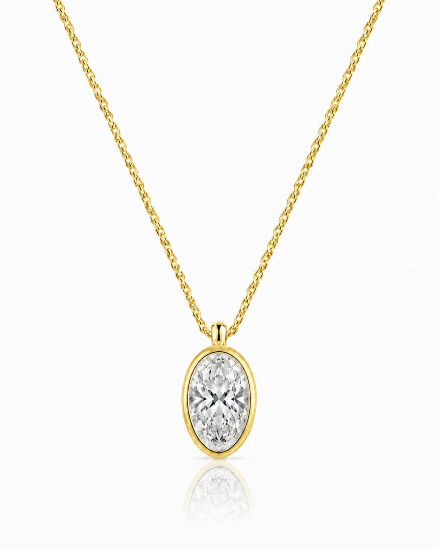 AUREX Oval Cut bezel necklace setting in yellow gold | SARATTI