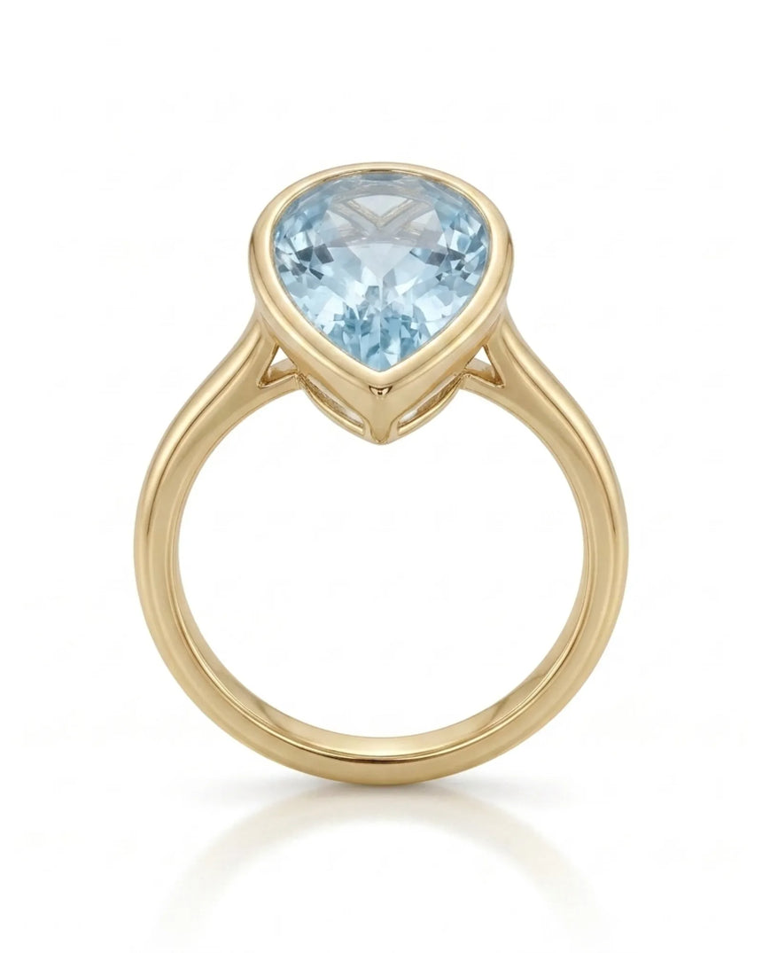 AUREX pear cut Aquamarine bezel solitaire ring setting in Yellow Gold, top view | SARATTI