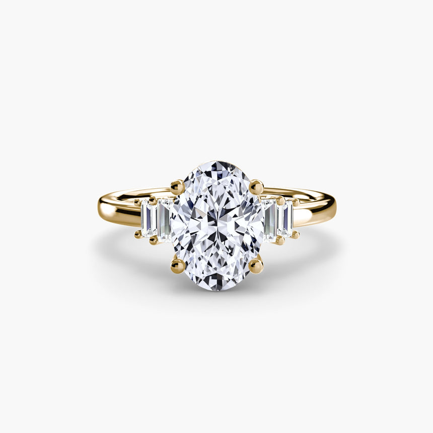 AVENIR oval cut tapered baguette solitaire ring setting in yellow gold | SARATTI