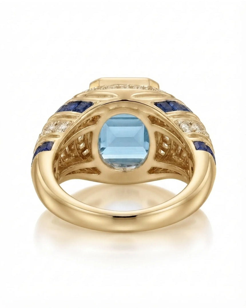 Azzurro Regent emerald-cut Aquamarine cocktail ring setting in yellow gold, underside showing open geometric gallery and broad shank | SARATTI