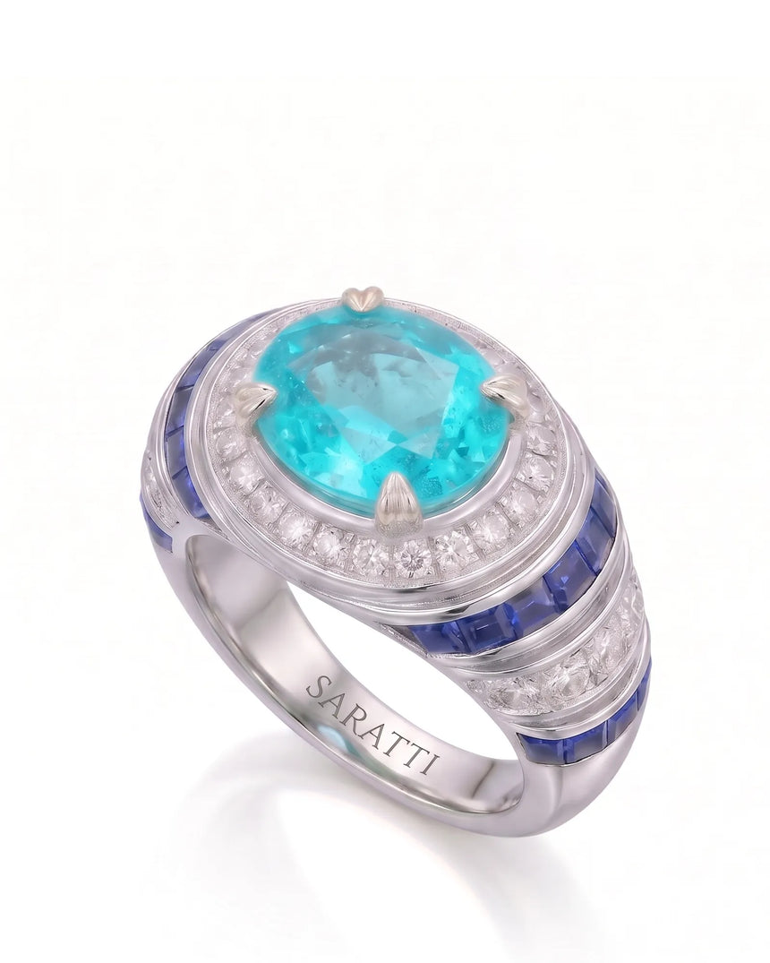 AZZURRO REGENT oval Paraiba tourmaline cocktail setting in white gold, front view showing the diamond halo | SARATTI