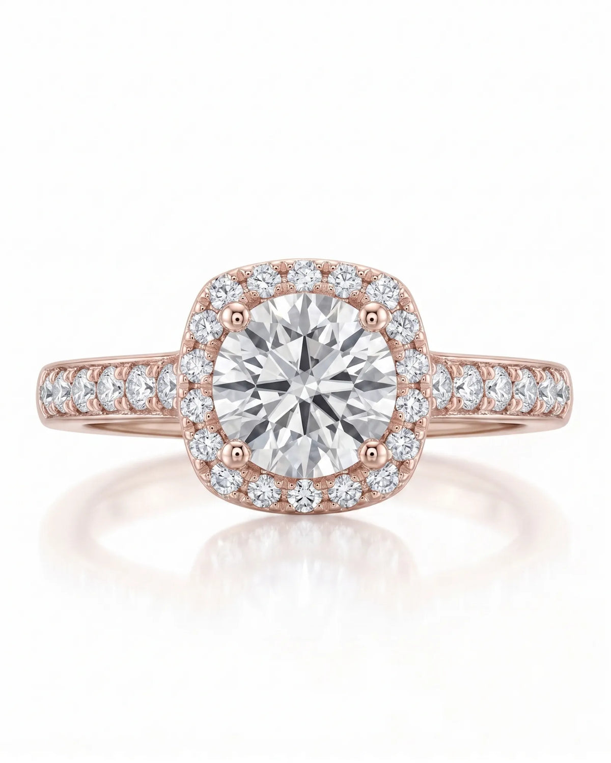 BEA 0.50 carat round natural diamond halo engagement ring in 18K rose gold, front view of cushion halo and pavé shoulders | SARATTI