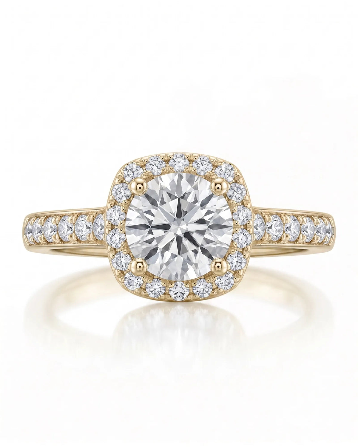 BEA 0.50 carat round natural diamond halo engagement ring in 18K yellow gold, front view of cushion halo and pavé shoulders | SARATTI