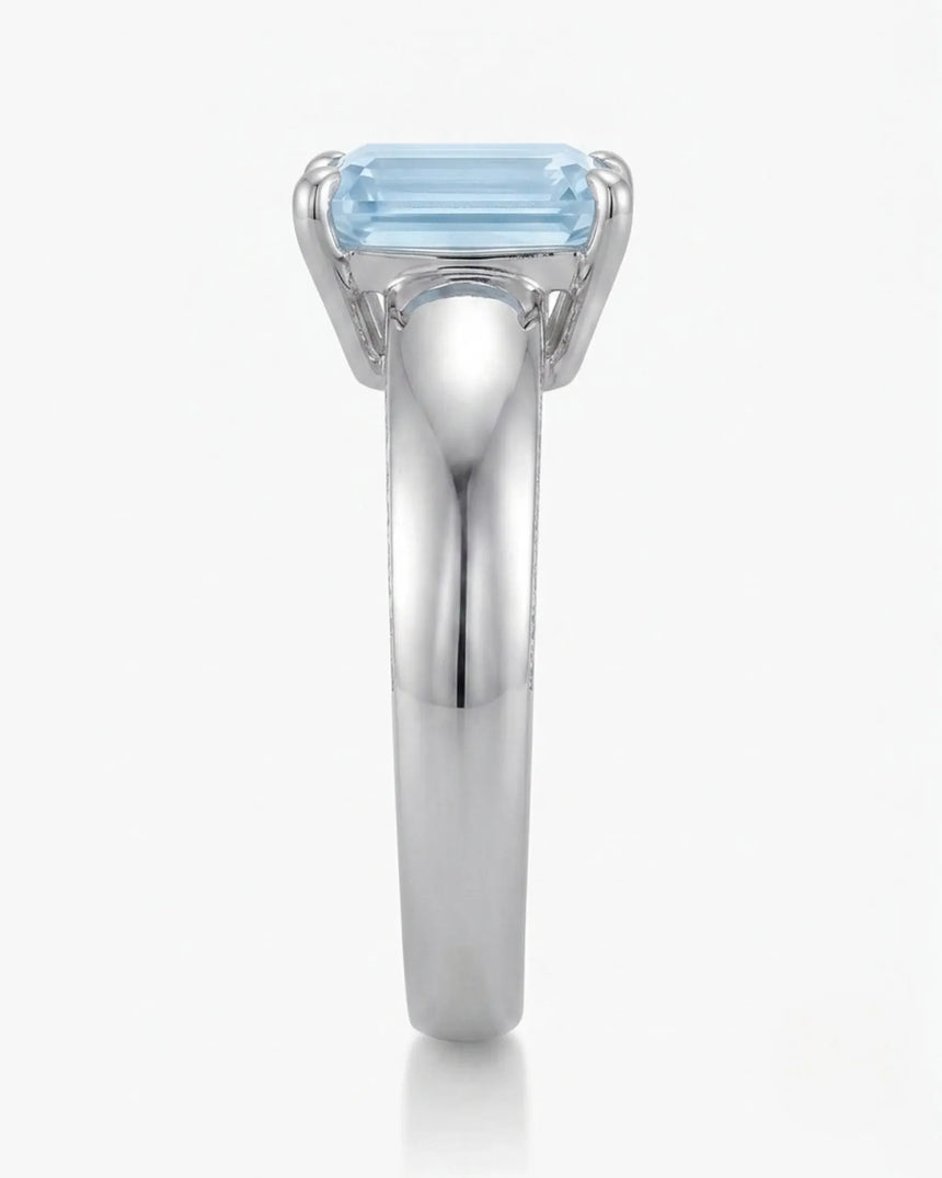 Céleste Arc emerald cut Aquamarine ring setting in Platinum, side profile with open basket | SARATTI