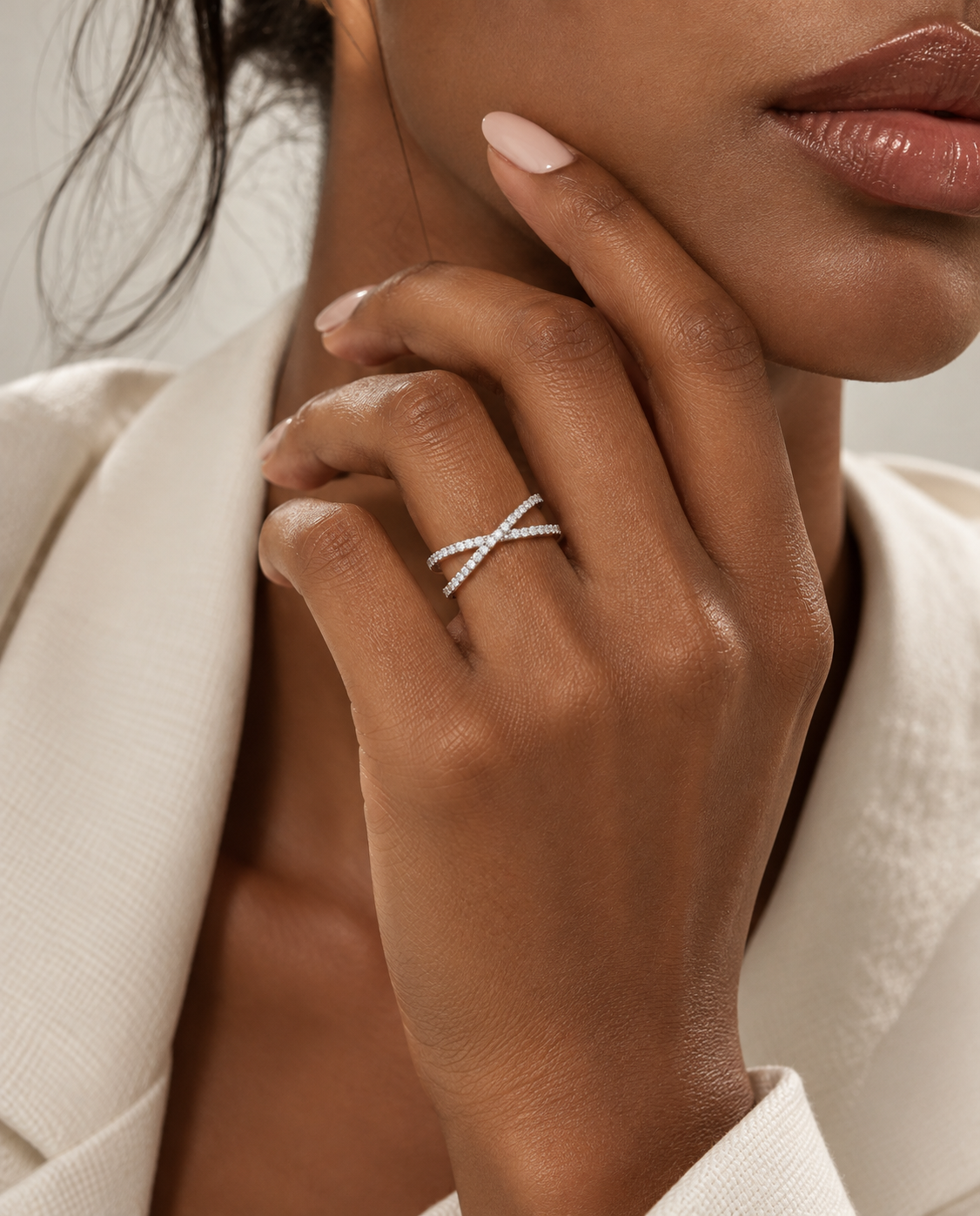 Beauty portrait of the criss cross diamond wedding band in platinum with round brilliant diamonds | SARATTI