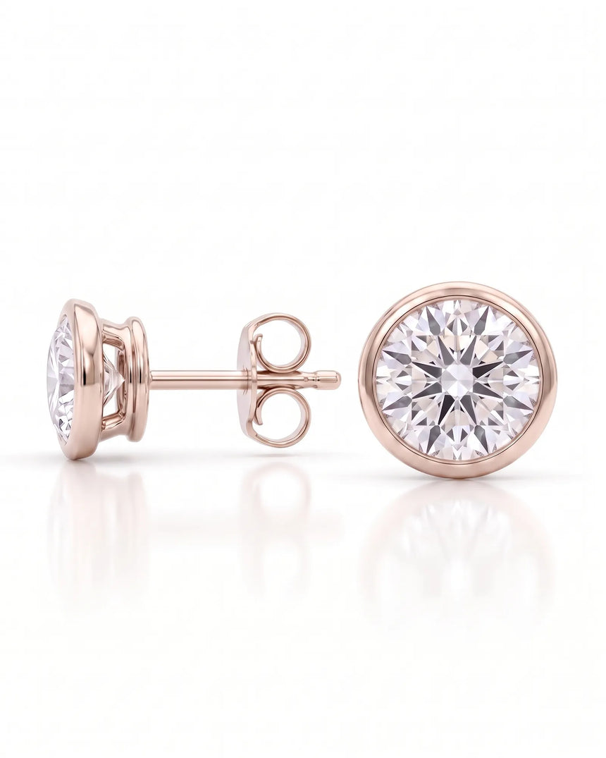 1.00 ct. tw. lab-grown round diamond full-bezel stud earrings in 14K rose gold, bezel detail | SARATTI