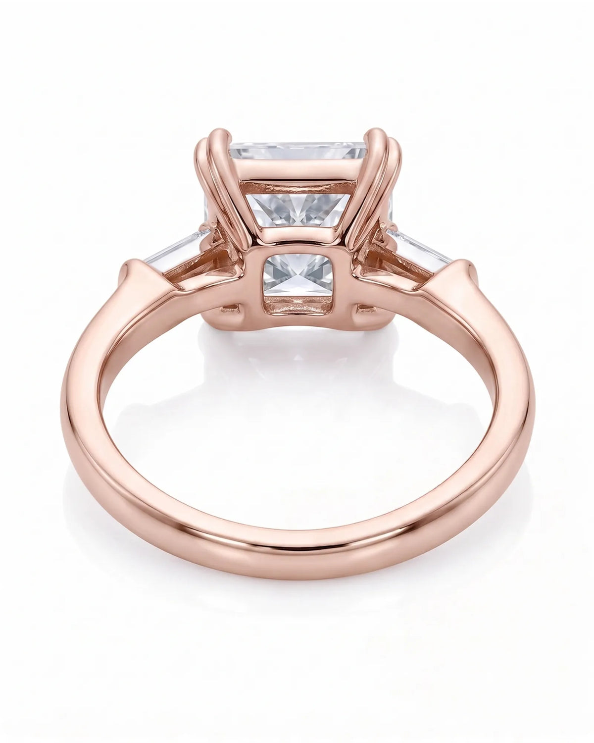 Diane 1 carat F-colour princess natural diamond three-stone ring in 18K rose gold, underside view of three-stone setting | SARATTI