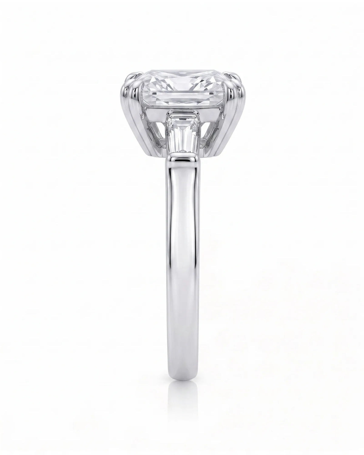 Diane 1 carat F-colour princess natural diamond three-stone ring in 18K white gold, side profile showing raised open three-stone gallery | SARATTI