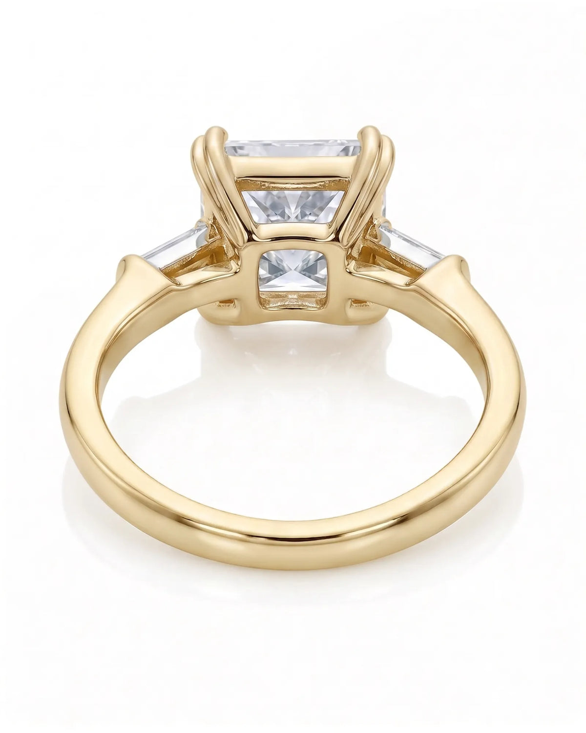 Diane 1 carat F-colour princess natural diamond three-stone ring in 18K yellow gold, underside view of three-stone setting | SARATTI