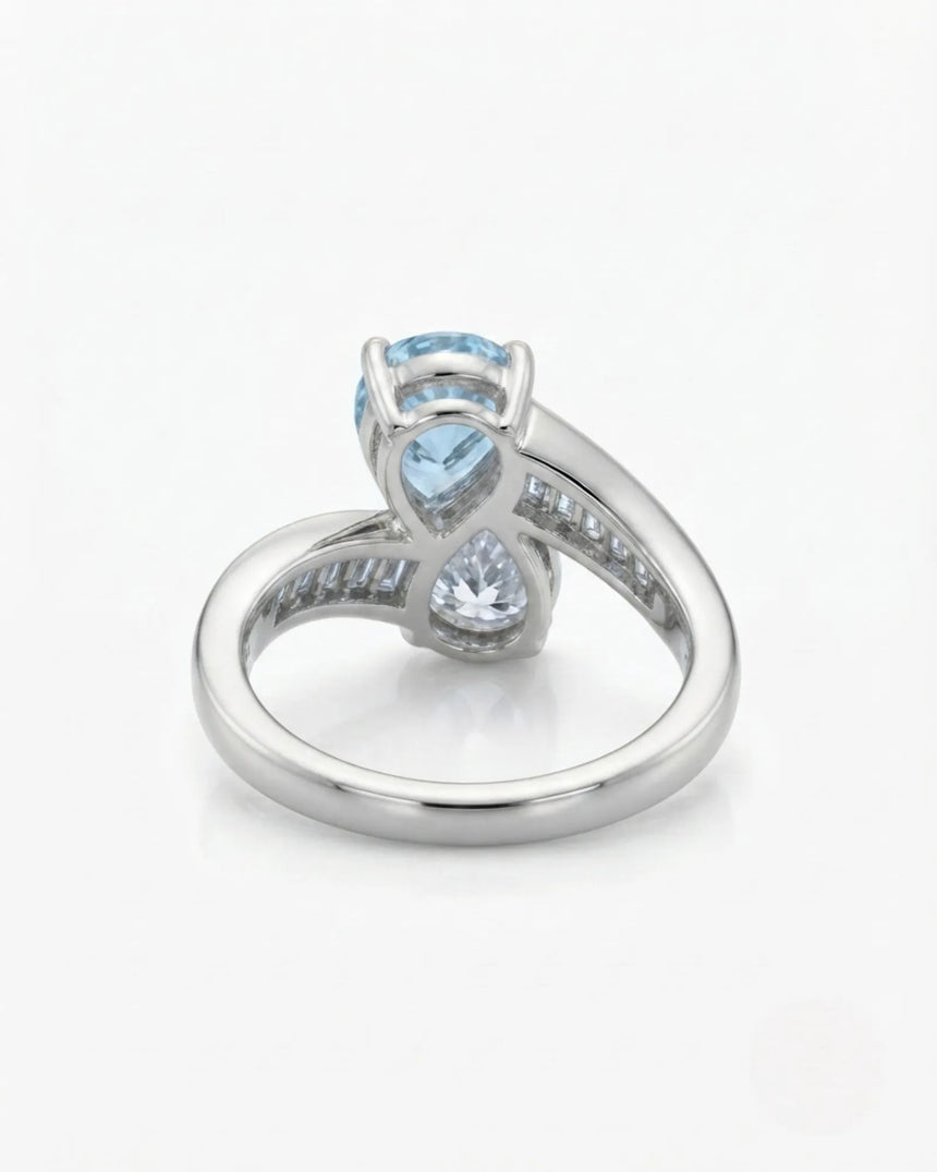 Élan Céleste pear-cut Aquamarine bypass ring setting in Platinum, underside showing curved crossover band and open gallery | SARATTI