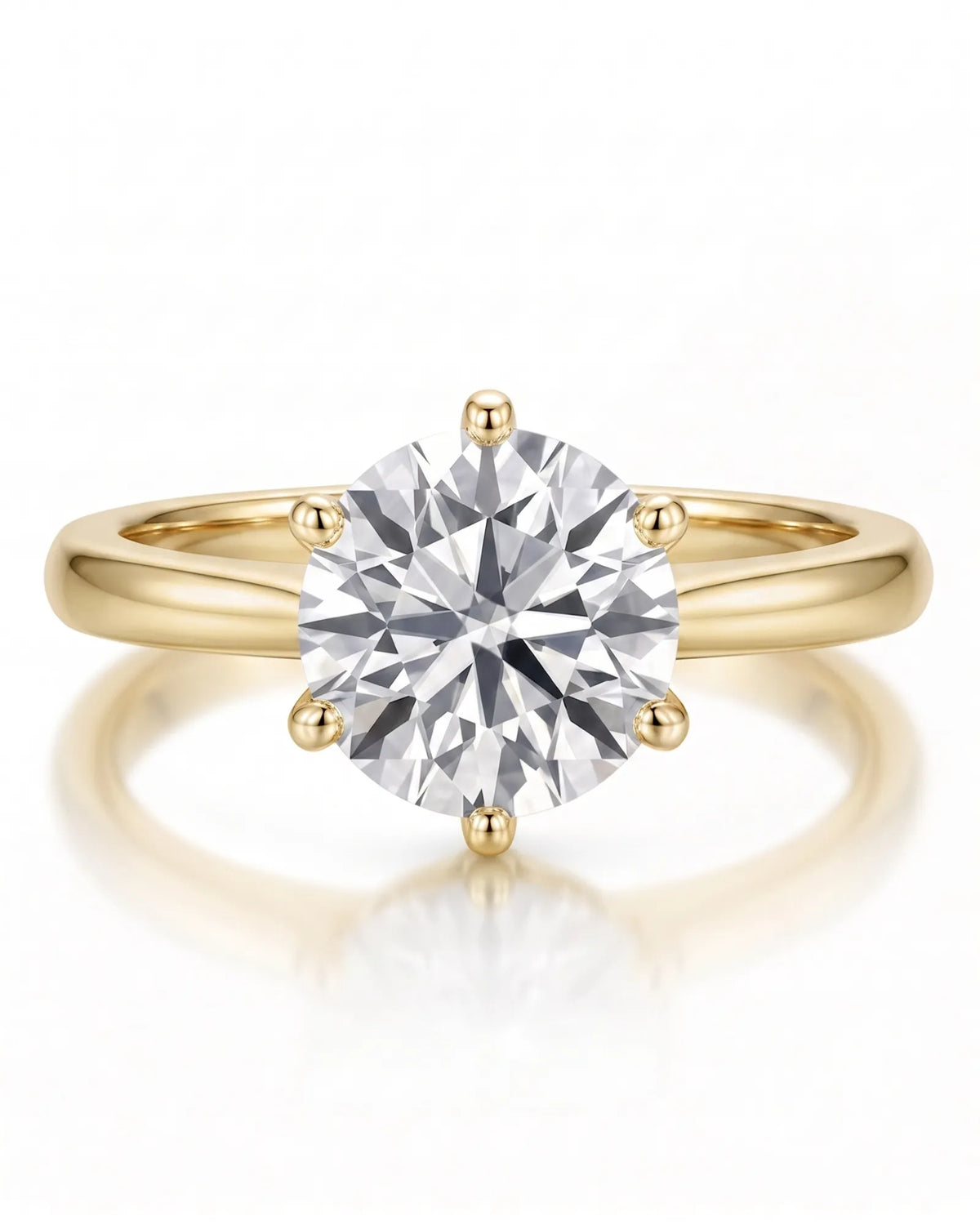 Estelle 1 carat F-colour round natural diamond crown solitaire ring in 18K yellow gold, front view of sculpted six-prong crown | SARATTI