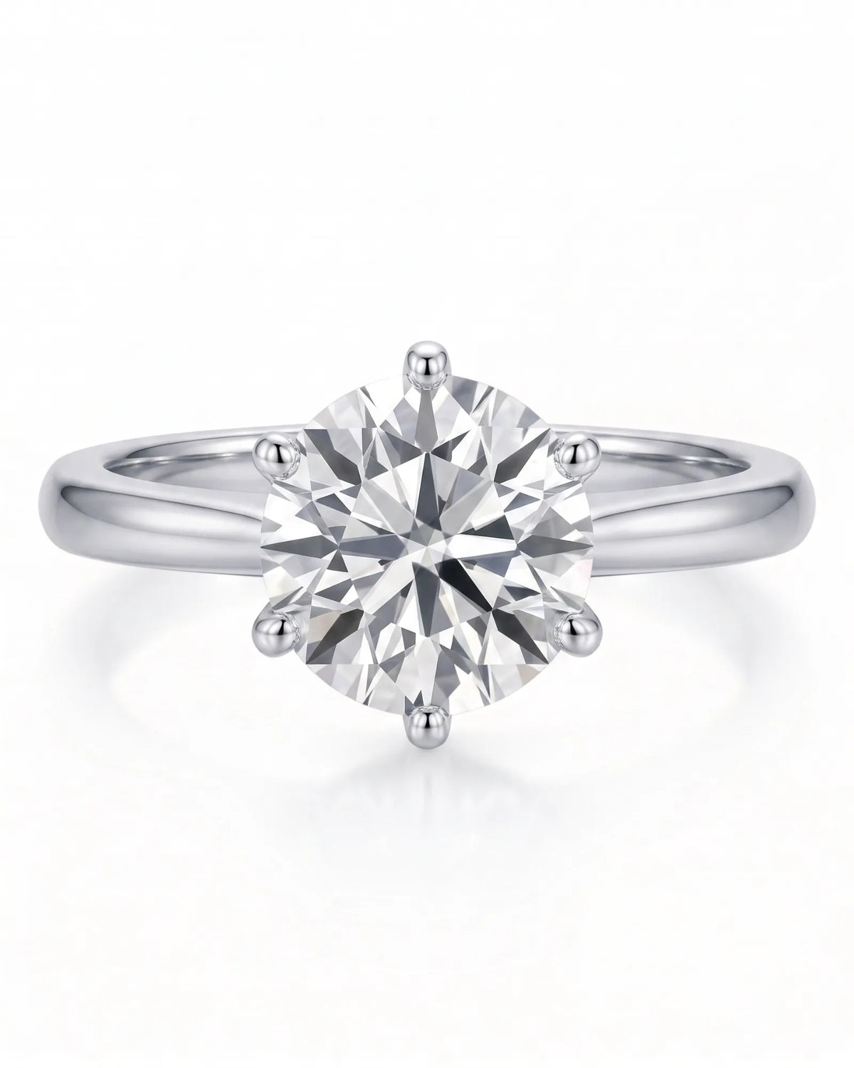 Estelle 1 carat F-colour round natural diamond crown solitaire ring in platinum, front view of sculpted six-prong crown | SARATTI