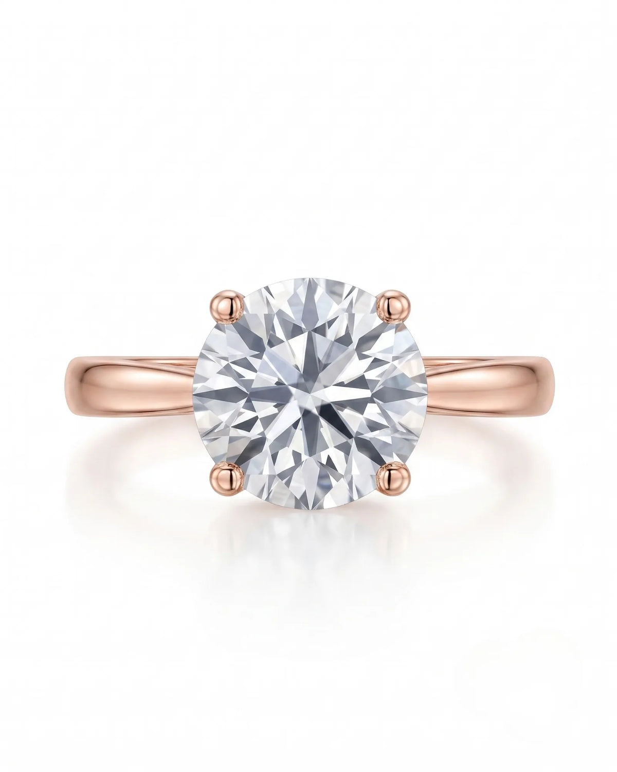 FORIA 1 carat round natural diamond sculpted solitaire ring in 18K rose gold, front view of four-prong centre | SARATTI