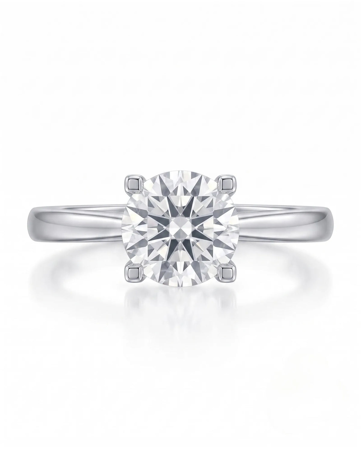 FORIA 1 carat round natural diamond sculpted solitaire ring in 18K white gold, front view of four-prong centre | SARATTI