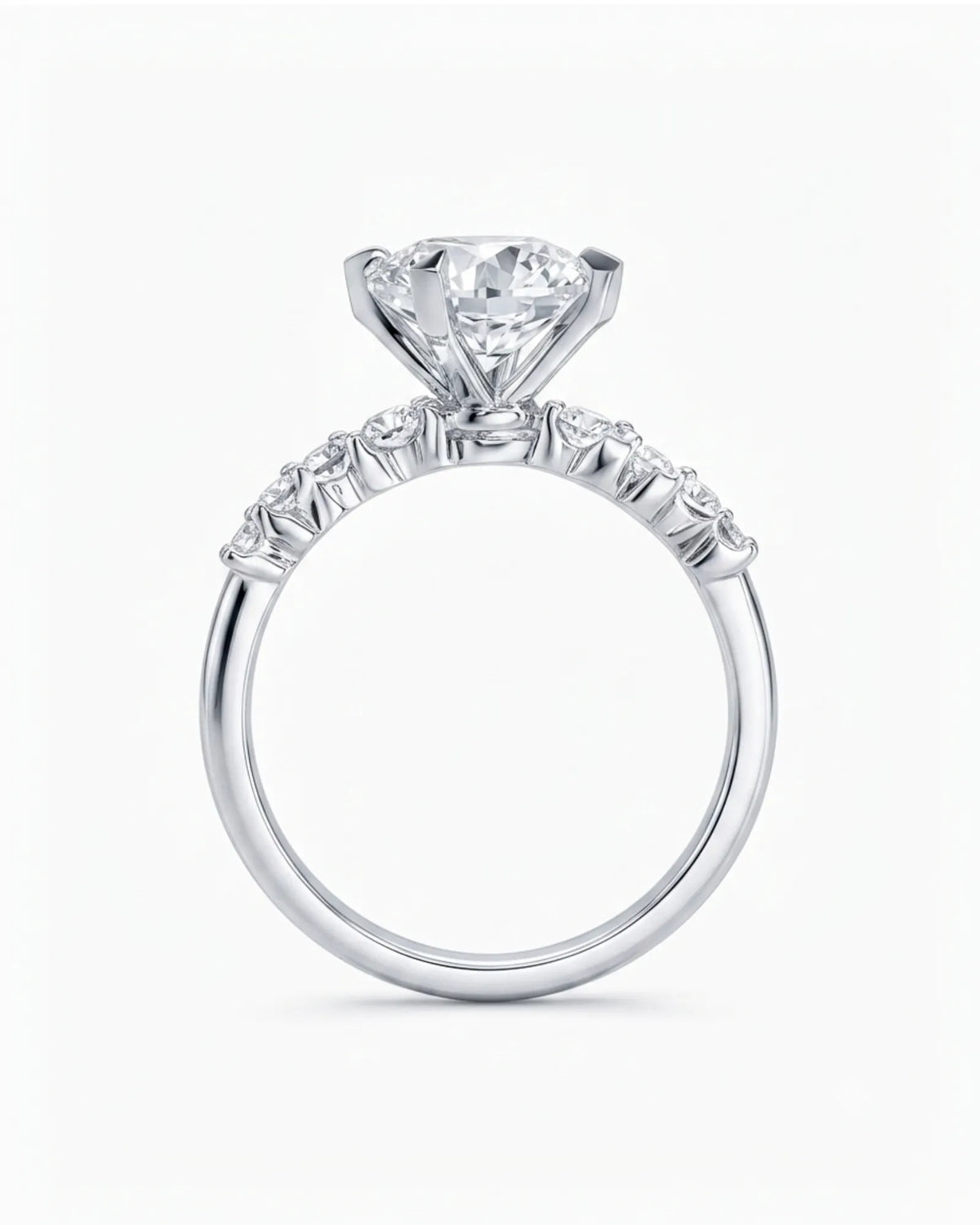 Joan 1 carat round natural diamond six-prong engagement ring in 18K white gold, side profile | SARATTI