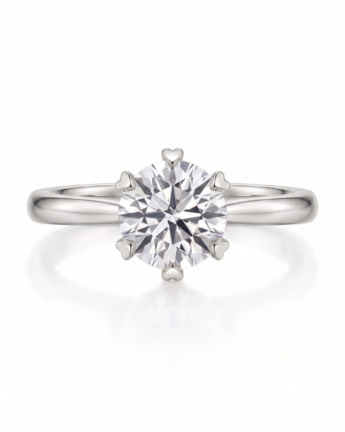 KATYA 1 carat round natural diamond heart-prong solitaire ring in 18K white gold, front view of six heart-shaped prongs | SARATTI