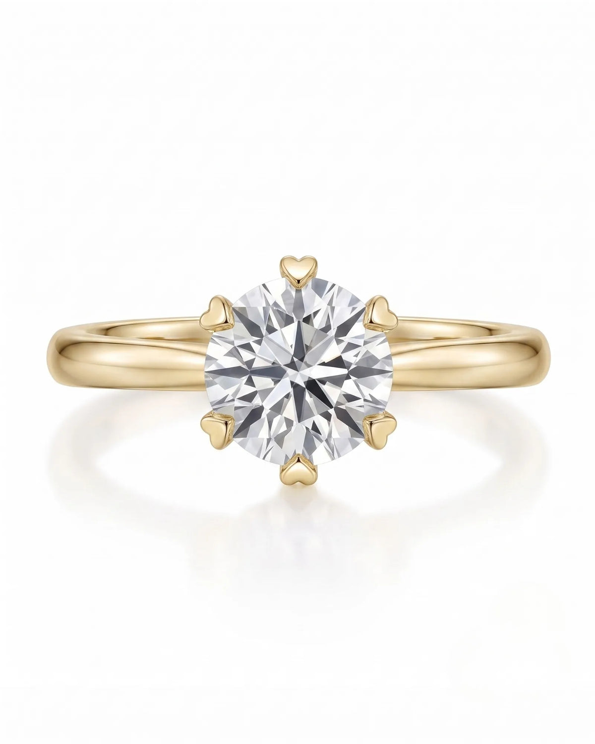 KATYA 1 carat round natural diamond heart-prong solitaire ring in 18K yellow gold, front view of six heart-shaped prongs | SARATTI
