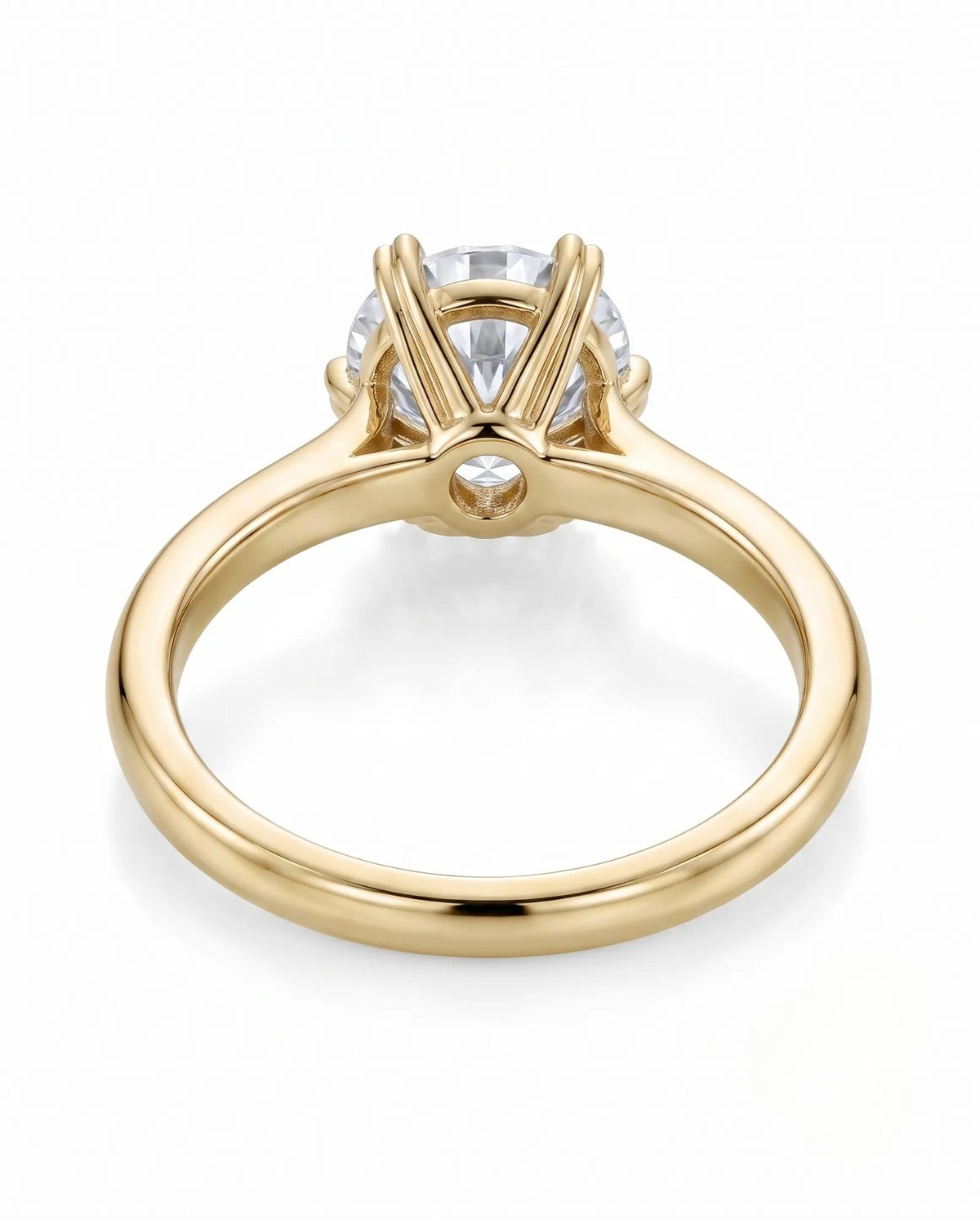 KATYA 1 carat round natural diamond heart-prong solitaire ring in 18K yellow gold, underside view of heart-shaped six-prong crown | SARATTI