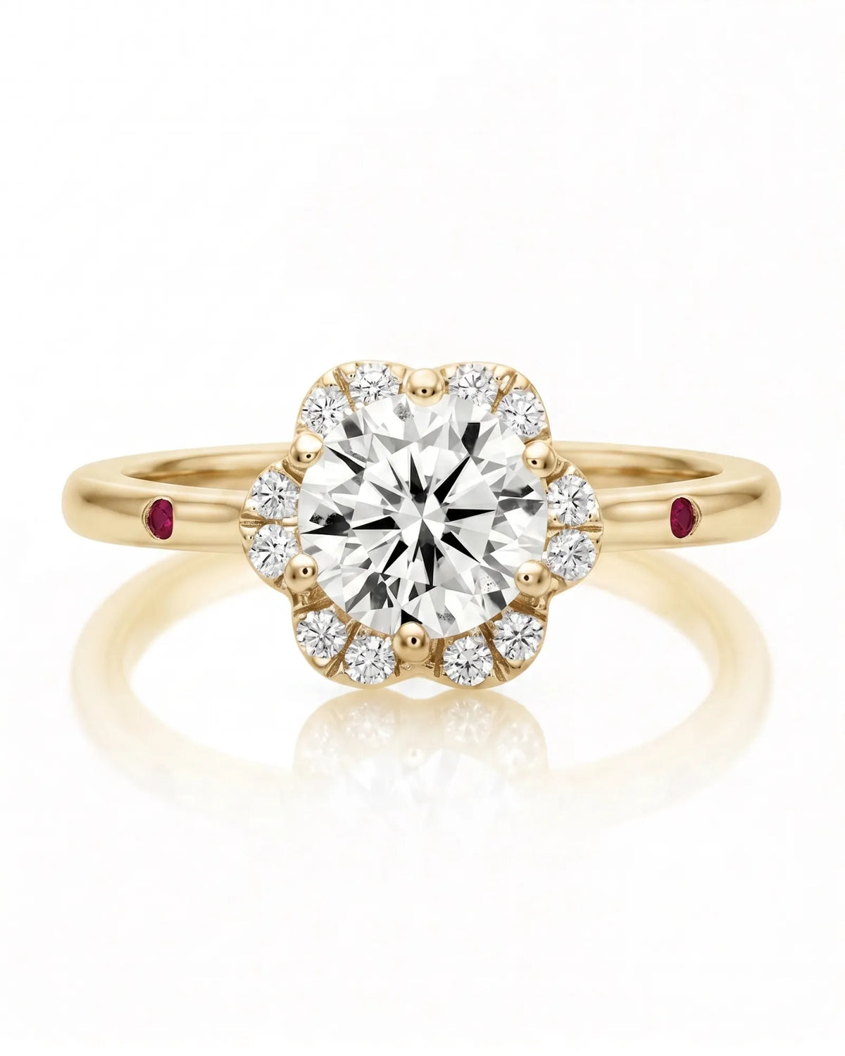 LILA 1 carat round natural diamond halo engagement ring with natural ruby shoulder accents in 18K yellow gold, front view of floral diamond halo | SARATTI