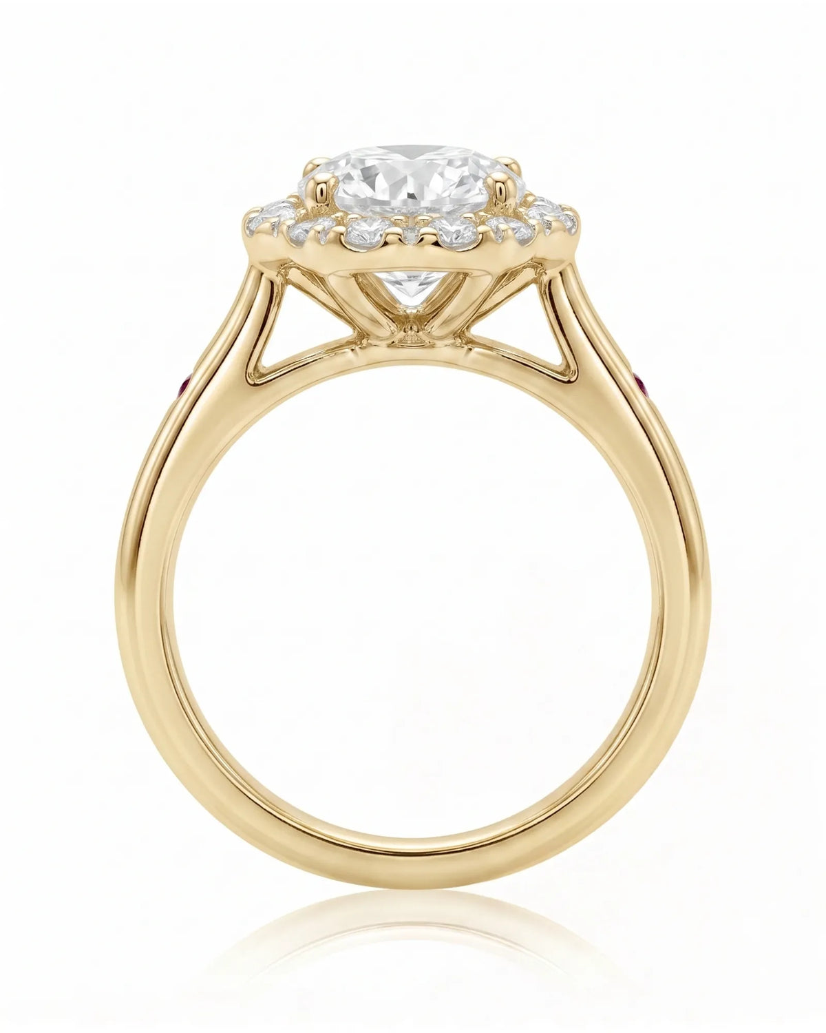 LILA 1 carat round natural diamond halo engagement ring with natural ruby shoulder accents in 18K yellow gold, side profile showing four-prong crown and open gallery | SARATTI