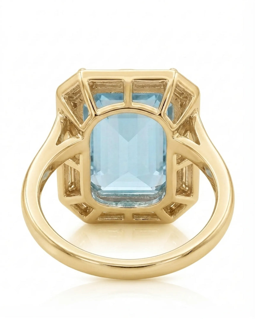 Lumière Octave emerald-cut Aquamarine ring setting in yellow gold, underside showing open octagonal gallery and supported crown | SARATTI